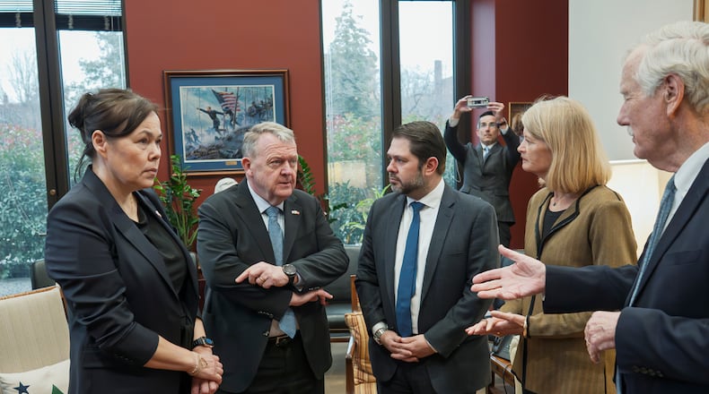 From left, Greenland Foreign Minister Vivian Motzfeldt, Danish Foreign Minister Lars Løkke Rasmussen, Sen. Ruben Gallego, D-Ariz., Sen. Lisa Murkowski, R-Alaska, and Sen. Angus King, I-Maine, begin a meeting on Capitol Hill as officials from Denmark and Greenland meet with lawmakers from the Arctic Caucus, at the Capitol in Washington, Wednesday, Jan. 14, 2026. (AP Photo/J. Scott Applewhite)