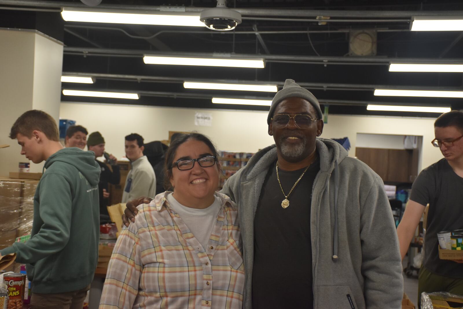 Tracy Davis Sr., a volunteer at Good Neighbor House, and Shellie Rice, the nonprofit's pantry manager, outreach coordinator and human services director. CORNELIUS FROLIK / STAFF
