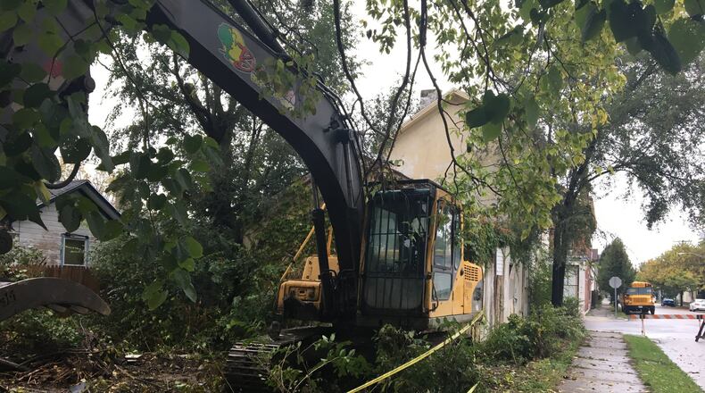 A program targeted for elimination by the Trump Administration provides millions of dollars to jurisdictions across southwest Ohio for neighborhood improvements, including demolition of abandoned homes. CORNELIUS FROLIK / STAFF