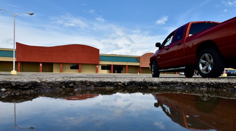 The Hamilton West Shopping Center, whose development plan first was approved in 1965, had a new plan for its redevelopment approved Monday by the Hamilton Planning Commission. People agree the property is important to development in the city, but disagreed about whether the plan in play is the most helpful for the area.