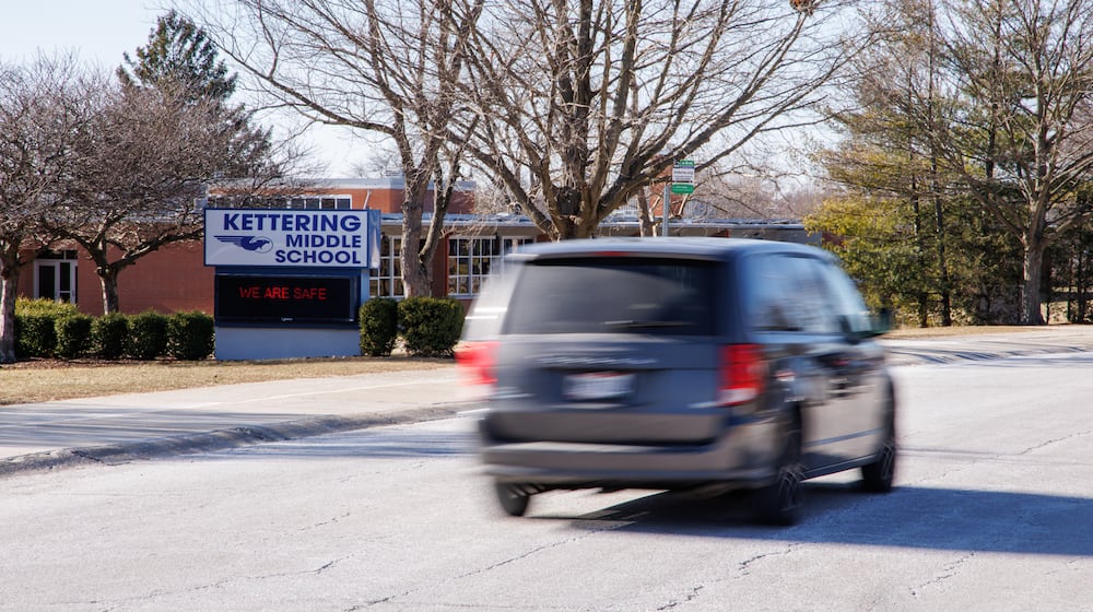 A van drives on Glengarry Drive near Kettering Middle School on Tuesday, Jan. 20. BRYANT BILLING/STAFF