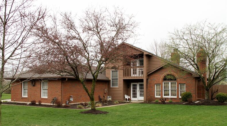 The house is located on a cul-de-sac with no rear neighbors, a side-entry, 3-car garage, fenced back yard and a nearby pond. CONTRIBUTED PHOTOS BY KATHY TYLER