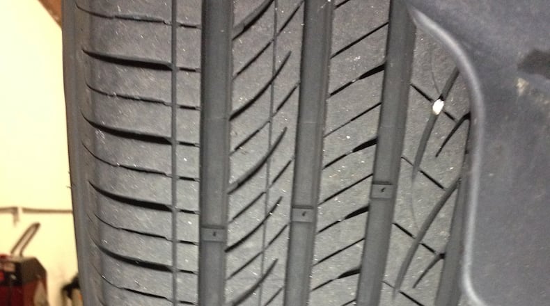 The tread design of some tires aligns perfectly with the grooves in the road, making the vehicle tend to follow the grooves instead of tracking straight down the road. James Halderman photo