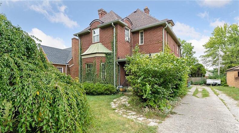 This tudor-style home at 1360 Cornell Drive has been listed on the popular real estate Instagram Cheap Old Houses at just $110,000.