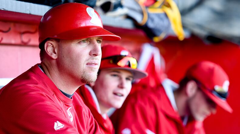 Sinclair baseball coach Steve Dintaman watches his team from the dugout during their game against Miami Hamilton Thursday, April 23, 2015, at Foundation Field in Hamilton. NICK GRAHAM/STAFF