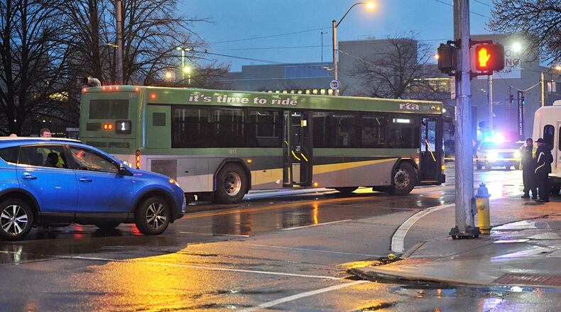 A woman was killed after a bus hit her crossing Third Street in March.