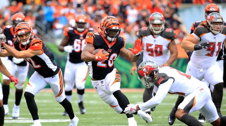 CINCINNATI, OH - OCTOBER 28: Joe Mixon #28 of the Cincinnati Bengals runs with the ball against the Tampa Bay Buccaneers at Paul Brown Stadium on October 28, 2018 in Cincinnati, Ohio. (Photo by Andy Lyons/Getty Images)