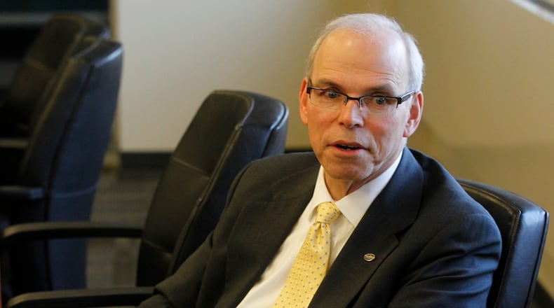 Tim Kambitsch, the Dayton Metro Library director since 2001, will retire in February.. CHRIS STEWART / STAFF