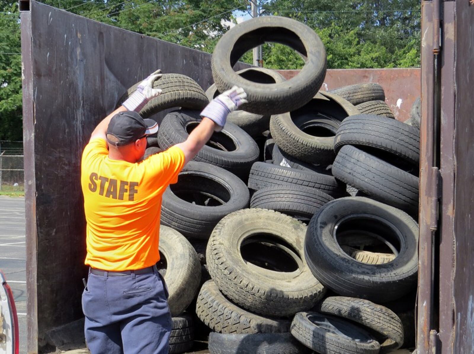 Workers accept tires at the annual Montgomery County tire buy-back event.