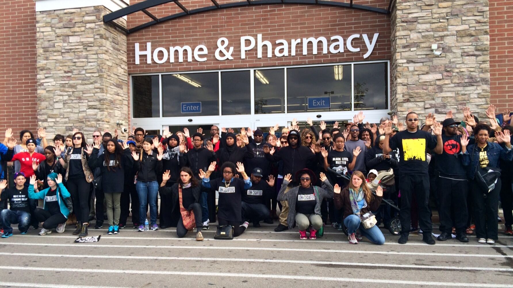 John Crawford supporters gather at Walmart