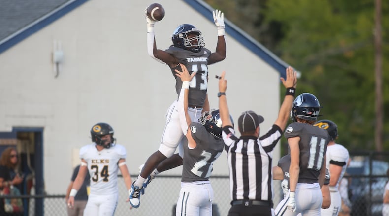 Fairmont celebrates a touchdown by Damien Pattin against Centerville on Friday, Sept. 13, 2024, at Roush Stadium. David Jablonski/Staff