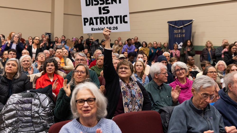 People gather in a show of solidarity with thousands of local Haitians who face the threat of deportation during a service at St. John Missionary Baptist Church in Springfield, Ohio, on Monday, Feb. 2, 2026. More than 1,000 people gathered to show solidarity in the Ohio city that is bracing for a crackdown after President Donald Trump thrust it into the spotlight. (Maddie McGarvey/The New York Times)