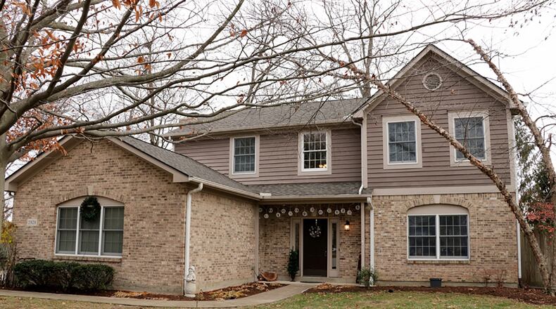 The 2-story has 3 bedrooms, formal areas and an office or possible fourth bedroom off the family room. CONTRIBUTED PHOTO BY KATHY TYLER