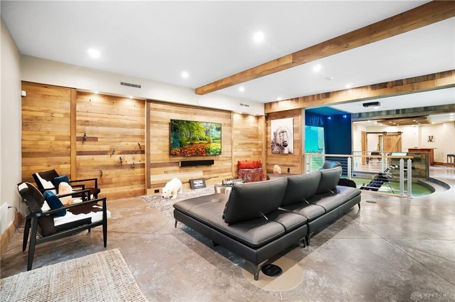 PHOTOS: Spectacular $1.8M luxury home on market with pool, golf simulator