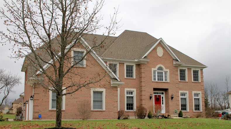 The brick 2-story has about 5,010 sq. ft. of living space. The house sits on a 0.81-acre property with a 3-car garage and is located on a cul-de-sac CONTRIBUTED PHOTOS BY KATHY TYLER