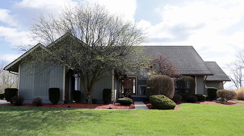 The 3-bedroom home includes about 3,300 sq. ft. of living space plus a finished lower level. The home offers a first-floor main bedroom and sunken great room. The basement includes a wet bar, media room and game room. CONTRIBUTED PHOTO BY KATHY TYLER