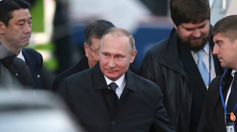 Russian President Vladimir Putin arrives at Yamaguchiube Airport in Ube western Japan. Putin arrived in Japan on Thursday for a two-day summit that marks his first official visit to a G-7 country since Russia's 2014 annexation of Crimea. (AP Photo/Koji Sasahara, pool)