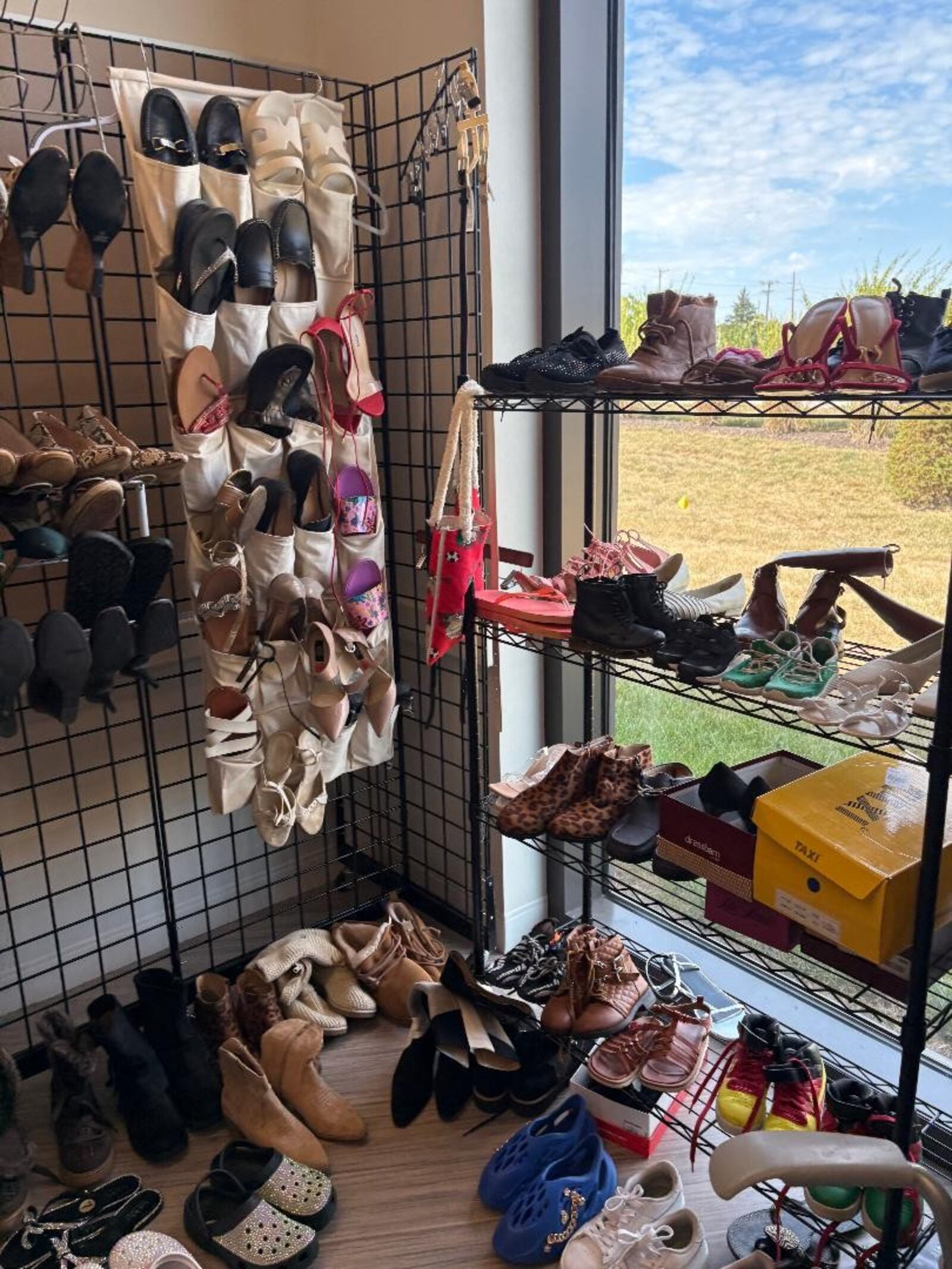 Shoes in all sizes can be found at the Essence of West Boutique. Photo by Russell Florence Jr.