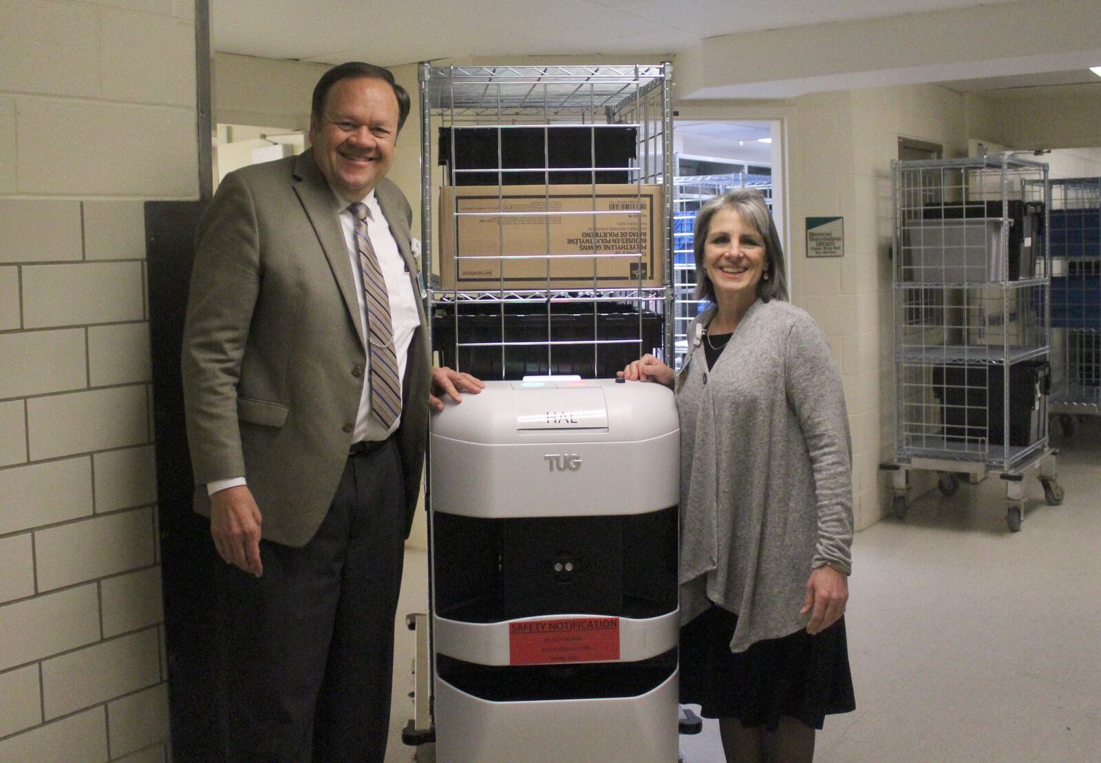Kettering Health Network's David Starkey and Cheryl Shimmin worked to introduce TUGs to the hospital chain.   The robots were introduced to Kettering Hospital in January.