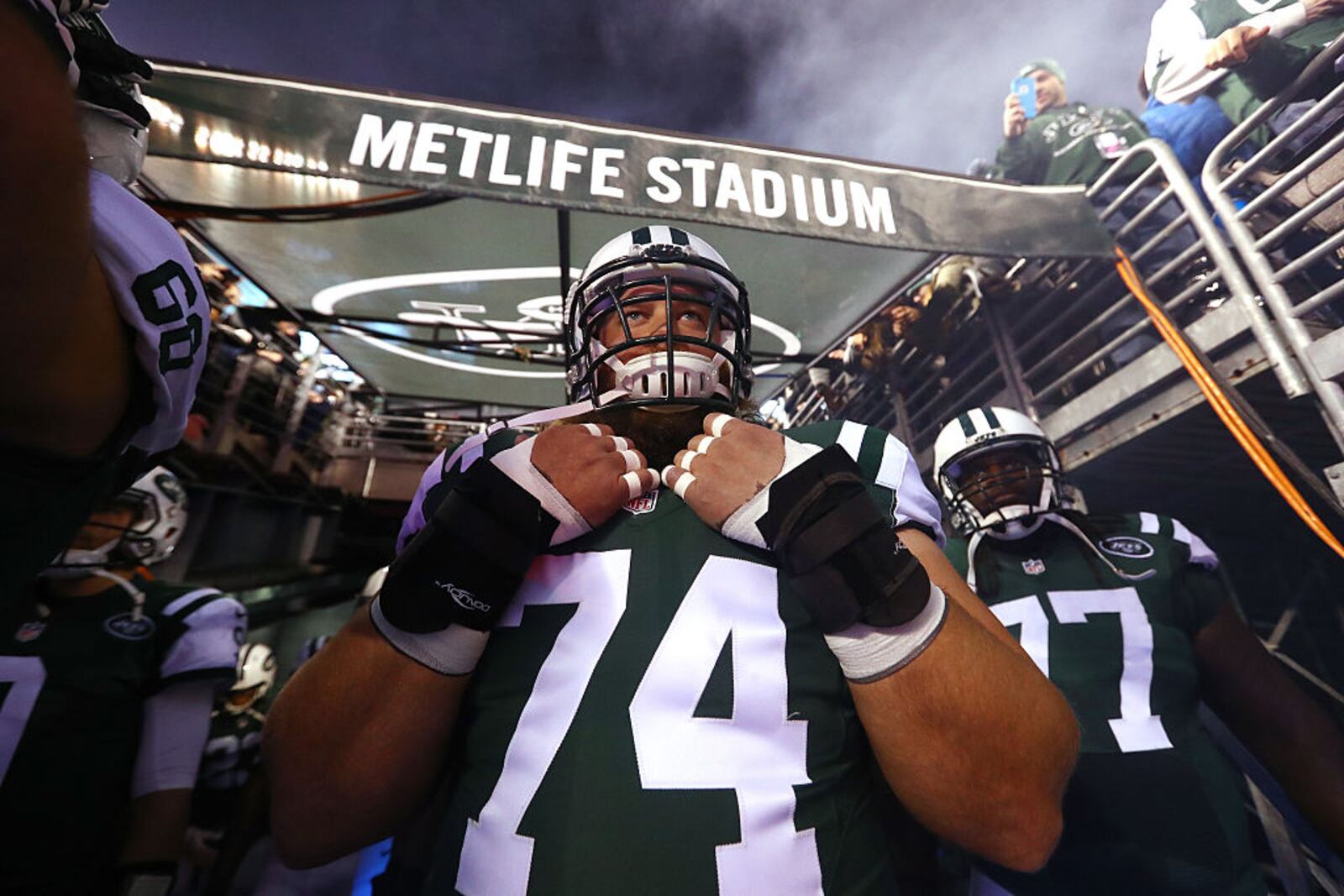 EAST RUTHERFORD, NJ - DECEMBER 05: Nick Mangold #74 of the New York Jets waits to be introduced against the Indianapolis Colts before their game at MetLife Stadium on December 5, 2016 in East Rutherford, New Jersey. (Photo by Al Bello/Getty Images)
