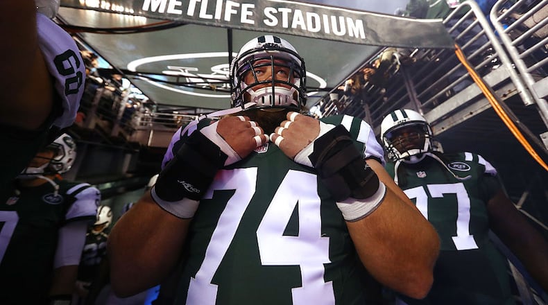 EAST RUTHERFORD, NJ - DECEMBER 05: Nick Mangold #74 of the New York Jets waits to be introduced against the Indianapolis Colts before their game at MetLife Stadium on December 5, 2016 in East Rutherford, New Jersey. (Photo by Al Bello/Getty Images)