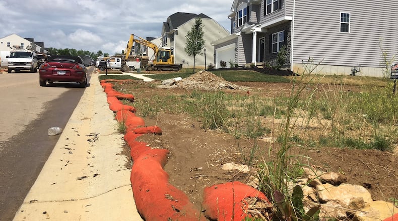 Homes are under construction at the new River Reserve development on Indian Ripple Road near Alpha Bellbrook Road in Beavercreek Twp. RICHARD WILSON/STAFF
