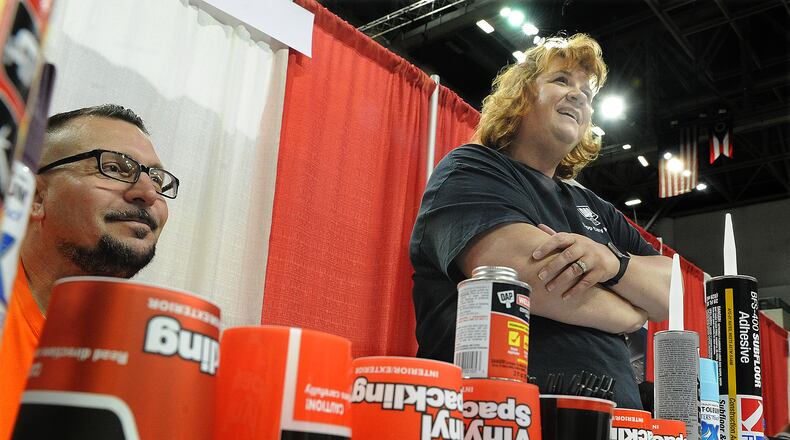 James Vangorden and Betsy Frappier, representing DAP Product Inc., manned a booth Wednesday, June, 29, 2022 at the Summer Job Fair held at the Wright State University Nutter Center, MARSHALL GORBY\STAFF