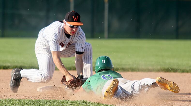 Waynesville shortstop Kyle Leis tags out Chaminade Julienne’s Darian Jones during their Division II regional semifinal at Mason on Friday. CONTRIBUTED PHOTO BY E.L. HUBBARD