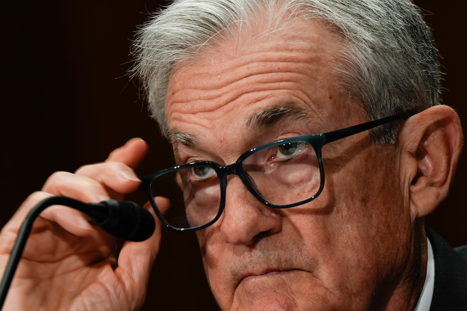 FILE - Federal Reserve Board Chairman Jerome Powell listens during a Senate Committee on Banking hearing, June 25, 2025, on Capitol Hill in Washington. (AP Photo/Julia Demaree Nikhinson, File)