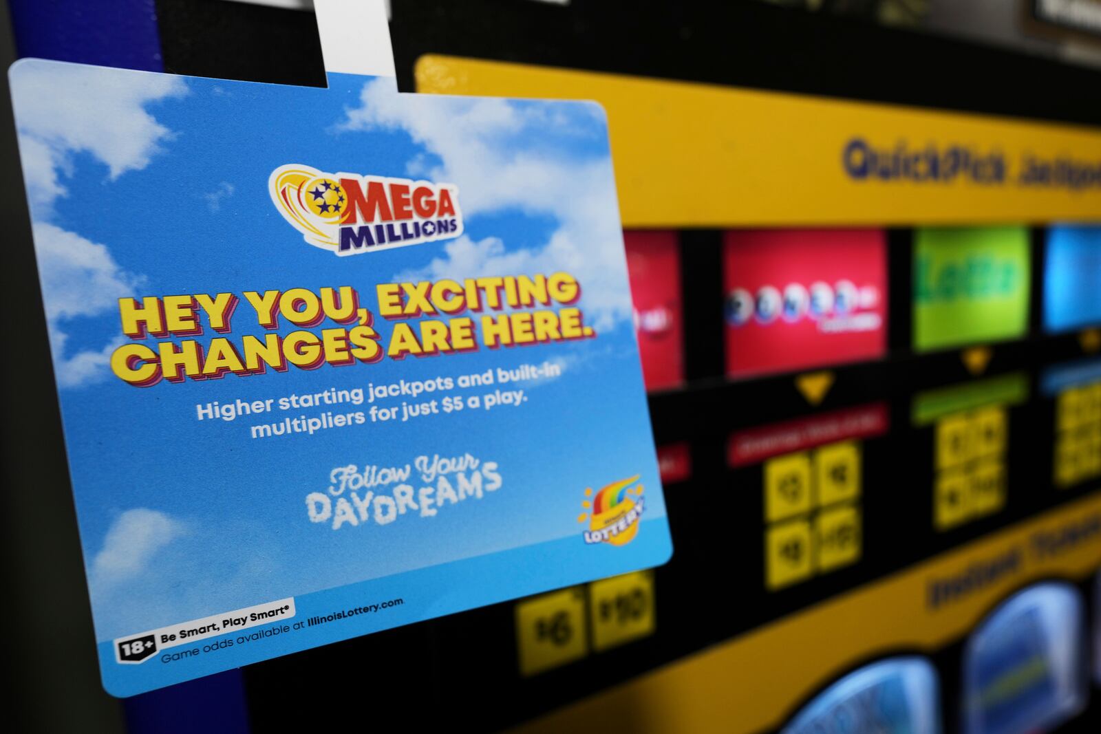Information sign about Mega Millions ticket prices are set to increase on lottery ticket vending machine at a convenience store in Chicago, Sunday, April 6, 2025. (AP Photo/Nam Y. Huh)