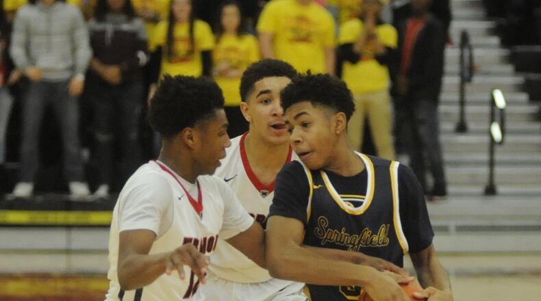 Springfield’s JaJuan Rodgers is tied up. Springfield defeated host Wayne 56-54 in a boys high school basketball game on Friday, Feb. 10, 2017. MARC PENDLETON / STAFF
