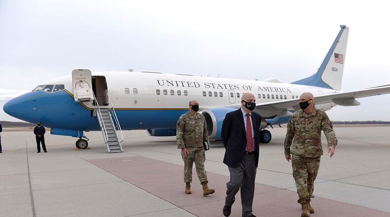 Acting Secretary of the Air Force John Roth talks with Gen. Arnold W. Bunch Jr., commander, Air Force Materiel Command, and Col. Patrick Miller, 88th Air Base Wing and installation commander at Wright-Patterson Air Force Base, Ohio, March 23, 2021. Roth met with Air Force personnel and toured several facilities at the base including the U.S. Air Force School of Aerospace Medicine Epidemiology Laboratory, which is responsible for analyzing a majority of the COVID-19 tests in the Air Force. U.S. AIR FORCE PHOTO/TY GREENLEES