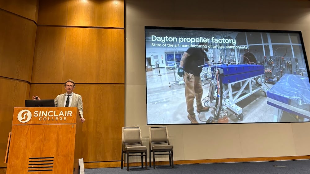 Eric Allison, Joby Aviation chief product officer, discussed his company's work in Dayton and beyond Friday Jan. 23, 2026 at Sinclair Community College. THOMAS GNAU/STAF