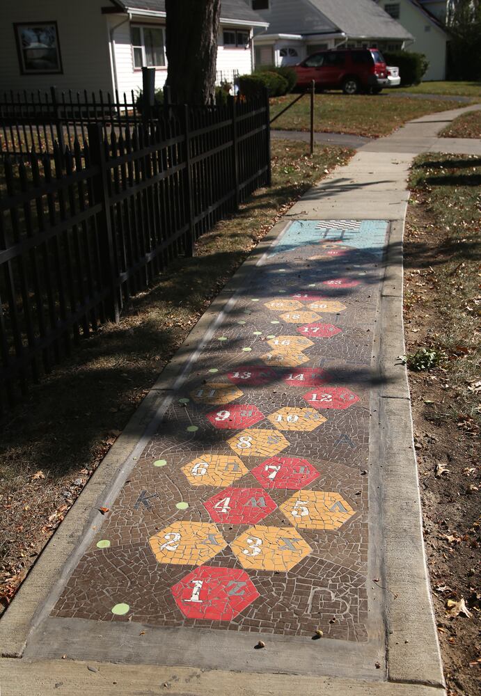 PHOTOS: Colorful mosaic artwork takes over a Kettering neighborhood