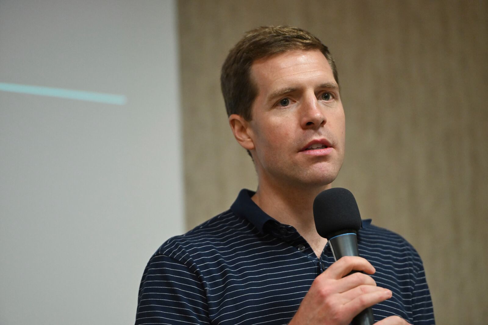 Conor Lamb pauses while speaking to the crowd at a town hall-style event organized by progressive groups at Central Penn College, Sunday, June 22, 2025, in Enola, Pa. (AP Photo/Marc Levy)
