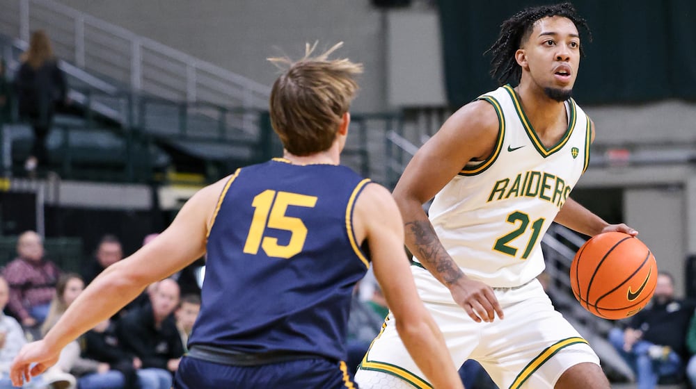Wright State junior guard Logan Woods looks to pass during an 86-37 win over Franklin College 86-37 in a season opener on Monday, Nov. 3 at Ervin J. Nutter Center in Fairborn. BRYANT BILLING/STAFF