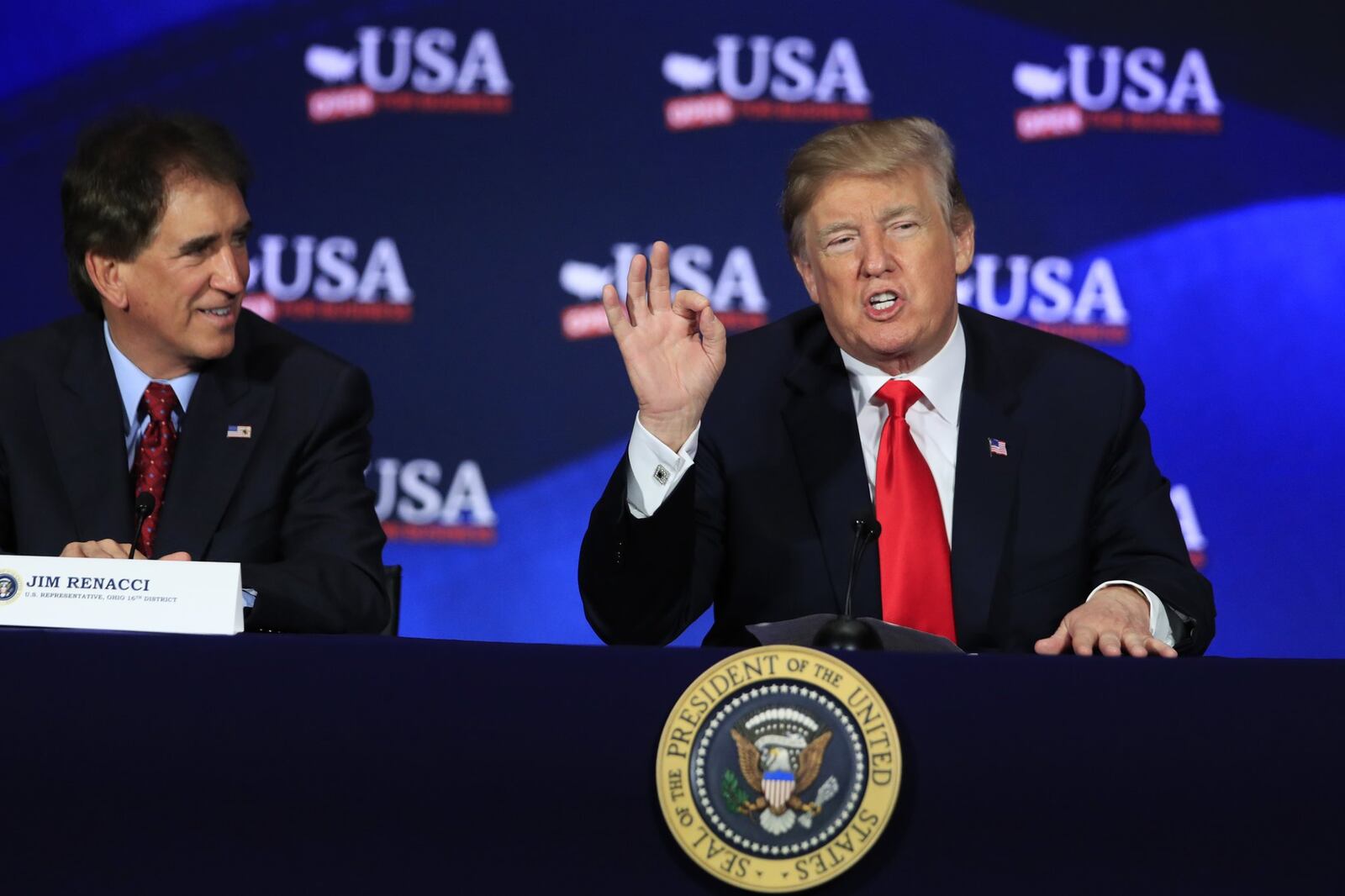 President Donald Trump speaks during a roundtable discussion on tax reform at the Cleveland Public Auditorium and Conference Center in Cleveland, Ohio, Saturday, May 5, 2018. At right is Rep. Jim Renacci, R-Ohio. (AP Photo/Manuel Balce Ceneta)