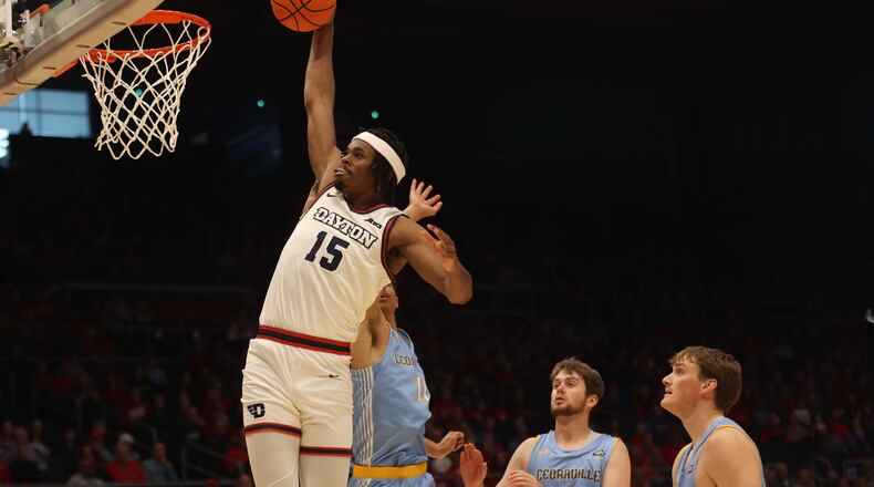 Dayton's DaRon Holmes II dunks against Cedarville on Saturday, Oct. 28, 2023, at UD Arena. David Jablonski/Staff
