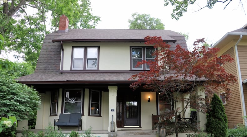 Listed for $549,900 by RE/MAX Victory and Affiliates, the stucco home in Oakwood has about 2,918 square feet of living space, including the third floor. KATHY TYLER / CONTRIBUTED PHOTOS