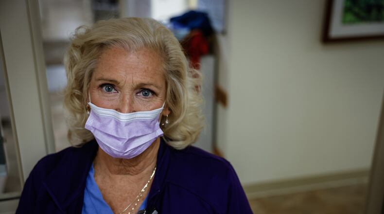 Kitty Lowry-Collins is a certified nurse midwife with Five Rivers Health Centers in Dayton. JIM NOELKER/STAFF