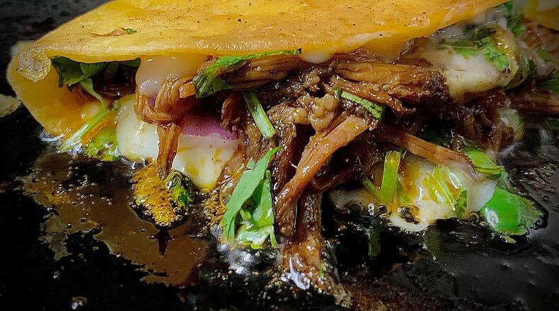 A Chef Darion Lewis beef taco on the grill Tuesday Sept. 20, 2022. MARSHALL GORBY\STAFF