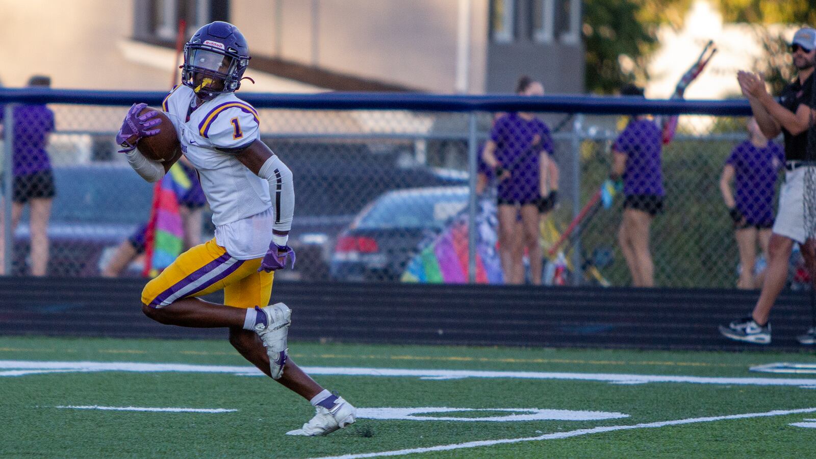 Bellbrook's Makai Smith breaks free for a 59-yard touchdown reception from Luke Benetis during the first half Friday night at Niswonger Field. Jeff Gilbert/CONTRIBUTED