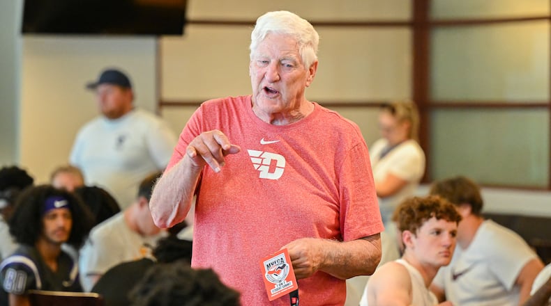 Former longtime area high school football coach Jim Place talks to players from Northmont, Alter, Piqua and Middletown in University of Dayton Arena during the Miami Valley Football Coaches Association Social Justice 7-on-7 on Wednesday, July 9. Place helped organize the fifth edition of the 7-on-7, which took place at various Dayton-area fields. Players participated in meet and greets with each other and discussed social justice. BRYANT BILLING / STAFF