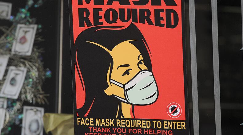 In the village of Yellow Springs, masks have been mandated indoors in the central business district and outdoors on public property downtown. MARSHALL GORBY\STAFF
