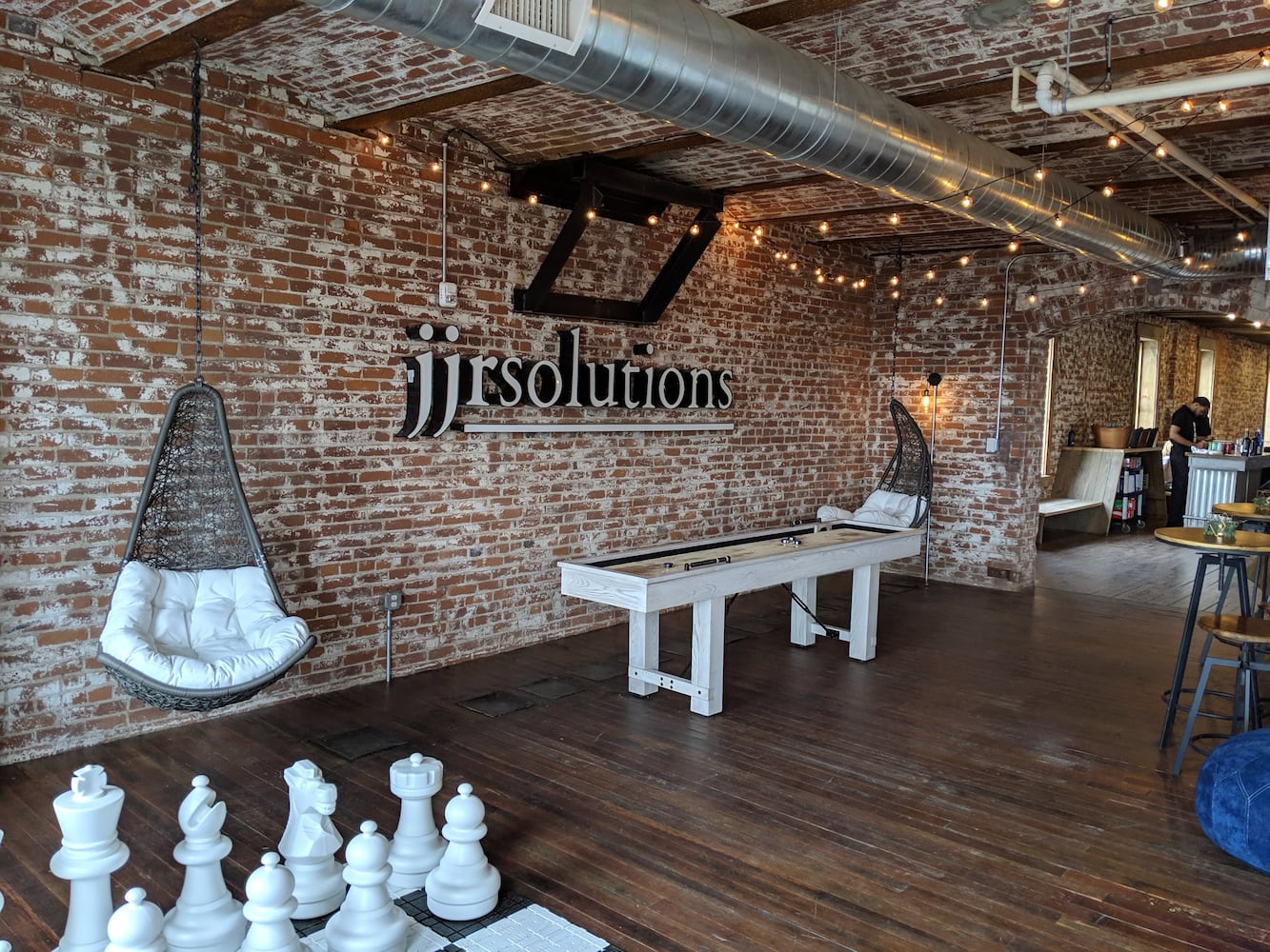 New Dayton office has giant chess, industrial slide