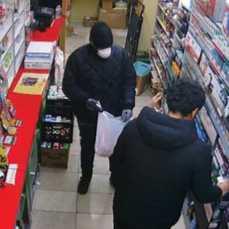 Surveillance cameras captured a suspect in an armed robbery at Sammy's Drive-Thru on Dec. 15, 2024. Photo courtesy Ohio Southern District Court.