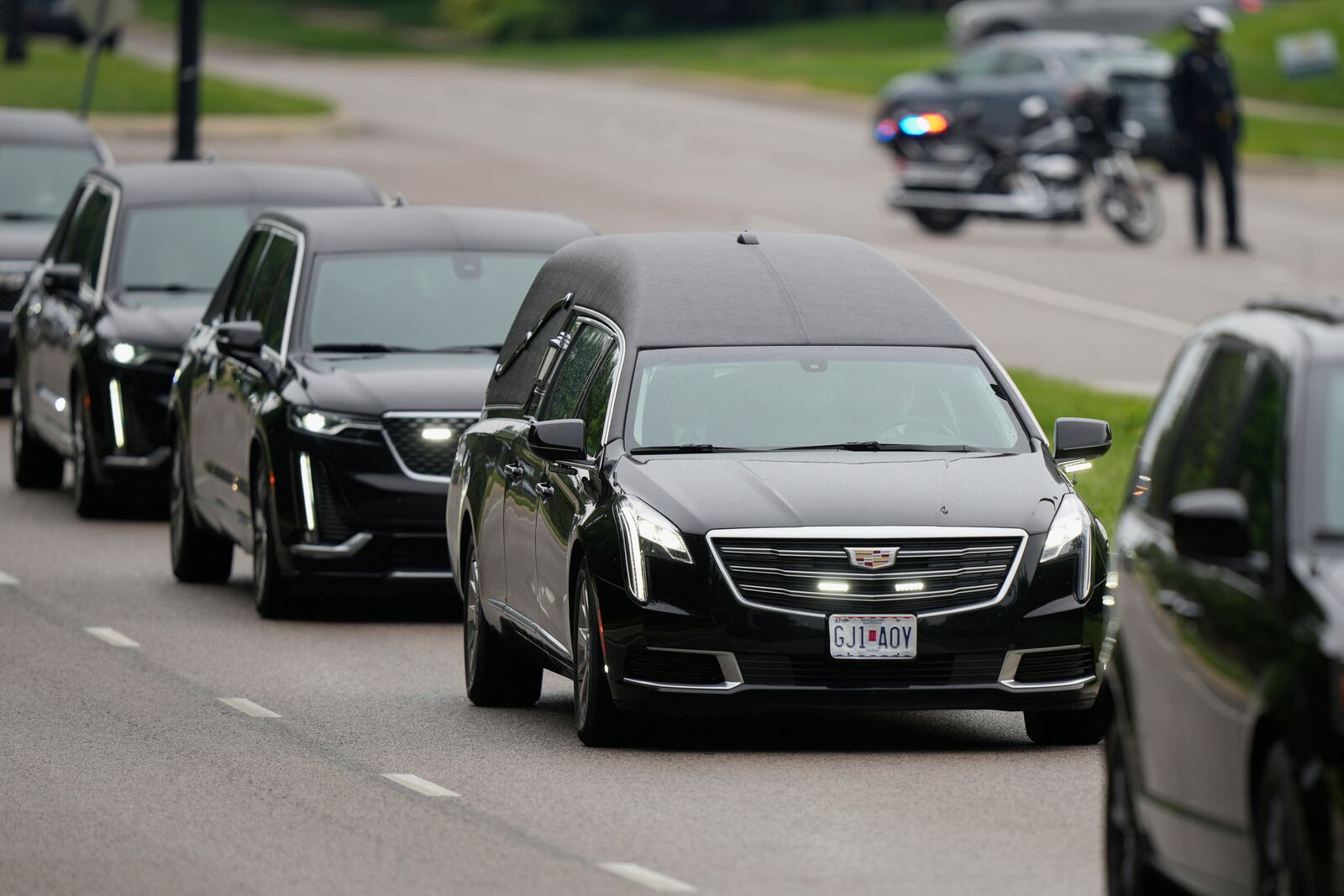 A funeral procession leaves Congregation Beth Torah after a funeral for Sarah Milgrim, a staffer at the Israeli Embassy who was killed last week outside a Washington Jewish museum, Tuesday, May 27, 2025, in Overland Park, Kan. (AP Photo/Charlie Riedel)