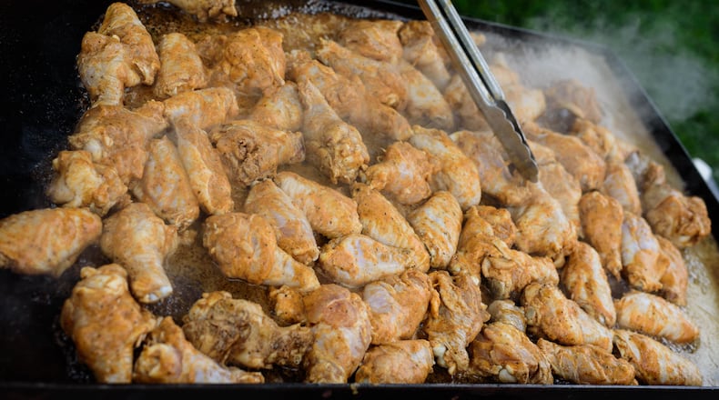 The Kickin’ Chicken Wing Fest, hosted by the Miami Valley Restaurant Association, will take place Saturday, July 13 at Fraze Pavilion. TOM GILLIAM / CONTRIBUTING PHOTOGRAPHER