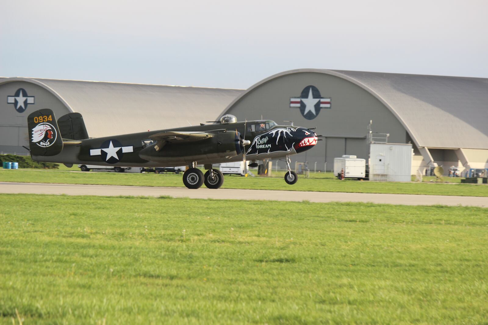 Thousands of people swarmed onto the airstrip at the National Museum of the U.S. Air Force on Monday, April 17, 2017, as 11 World War II era B-25s landed to mark the 75th anniversary of the historic Doolittle Raiders attack against Japan. CHUCK HAMLIN / STAFF