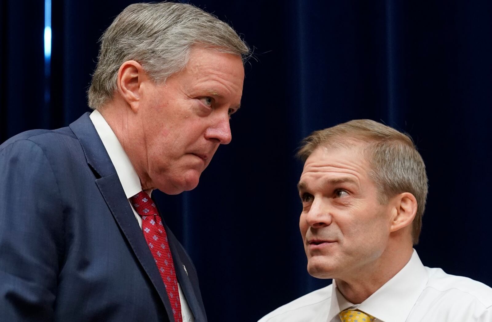 Rep. Mark Meadows (R-N.C.), left, and Ranking Member Rep. Jim Jordan (R-Ohio) talk at a hearing of the House Oversight and Reform Committee where Michael Cohen, President Donald Trump's former personal lawyer, gave testimony, on Capitol Hill in Washington, Feb. 27, 2019. (Erin Schaff/The New York Times)